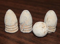 You can find fired or dropped (unfired) bullets for a couple bucks each at gas stations and gift shops around the battlefields