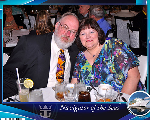 Us at the first formal dinner night in the Sapphire Room, the Main Dining Room on Royal Caribbean's Navigator of the Seas on our Caribbean Cruise vacation